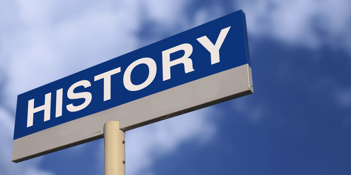 Sign with the word "HISTORY" against a blue sky background