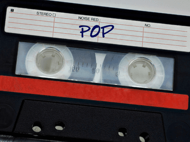 Black cassette tape with a red label marked "POP" on a textured background